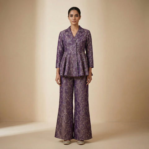 Fitted bodice with flared peplum top, wide leg palazzo pants. Suit - Deep Violet