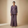 Fitted bodice with flared peplum top, wide leg palazzo pants. Suit - Deep Violet