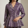 Fitted bodice with flared peplum top, wide leg palazzo pants. Suit - Deep Violet
