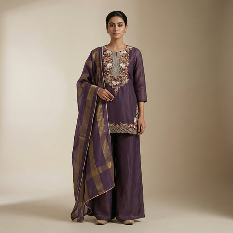 Straight fit kurti with three-quarter sleeves, paired with straight-leg pants. Suit - Plum Purple