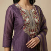 Straight fit kurti with three-quarter sleeves, paired with straight-leg pants. Suit - Plum Purple